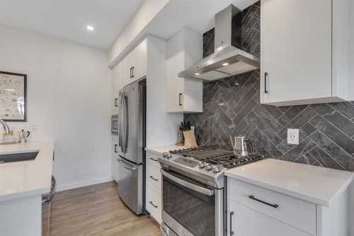 516 Greenbriar Common Nw, Calgary, AB - Indoor Photo Showing Kitchen With Stainless Steel Kitchen With Upgraded Kitchen