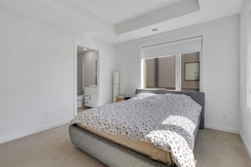 516 Greenbriar Common Nw, Calgary, AB - Indoor Photo Showing Bedroom