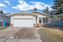 51 Woodmont Road SW Calgary, AB T2W 4L6