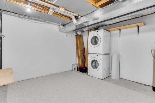 281 Elgin Gardens Se, Calgary, AB - Indoor Photo Showing Laundry Room