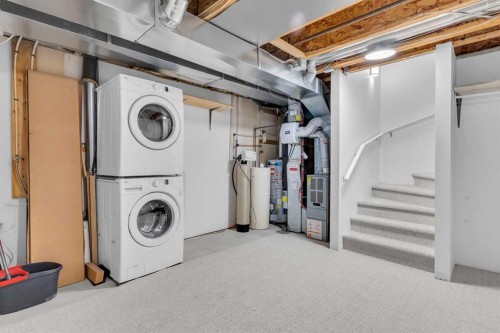 281 Elgin Gardens Se, Calgary, AB - Indoor Photo Showing Laundry Room