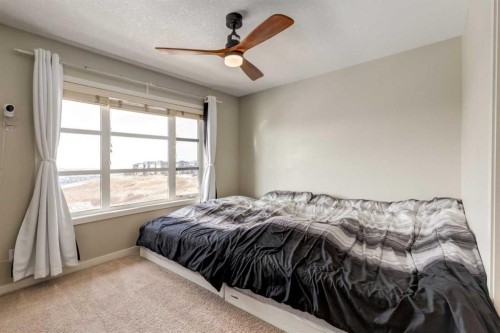 905 Evansridge Park Nw, Calgary, AB - Indoor Photo Showing Bedroom
