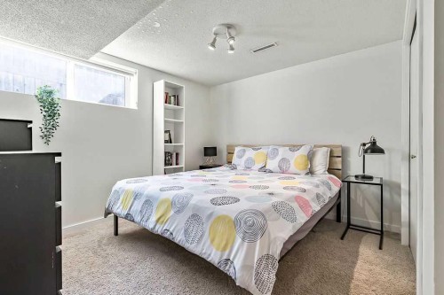955 Cannock Road Sw, Calgary, AB - Indoor Photo Showing Bedroom