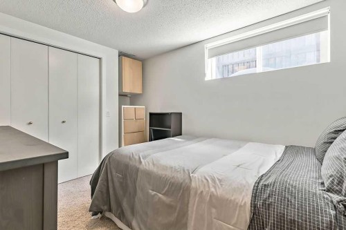 955 Cannock Road Sw, Calgary, AB - Indoor Photo Showing Bedroom