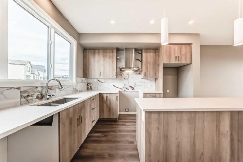 1328 Mahogany Boulevard Se, Calgary, AB - Indoor Photo Showing Kitchen With Double Sink With Upgraded Kitchen