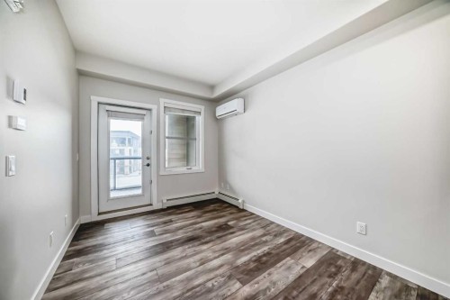 311-55 Wolf Hollow Crescent Se, Calgary, AB - Indoor Photo Showing Other Room