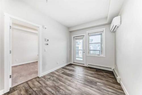 311-55 Wolf Hollow Crescent Se, Calgary, AB - Indoor Photo Showing Other Room