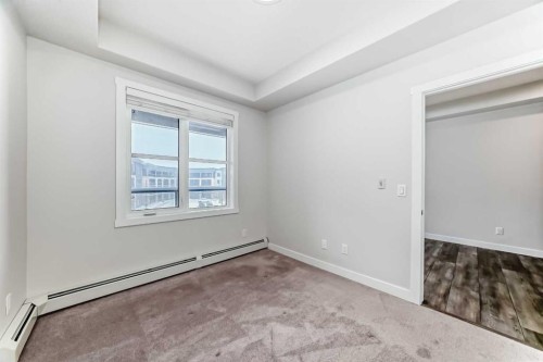 311-55 Wolf Hollow Crescent Se, Calgary, AB - Indoor Photo Showing Other Room