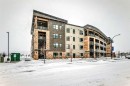 311-55 Wolf Hollow Crescent Se, Calgary, AB  - Outdoor With Balcony With Facade 