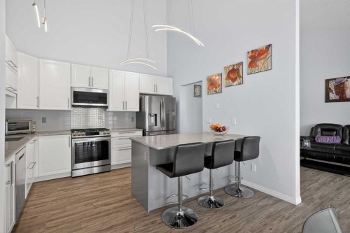 156 Sunlake Gardens Se, Calgary, AB - Indoor Photo Showing Kitchen With Upgraded Kitchen