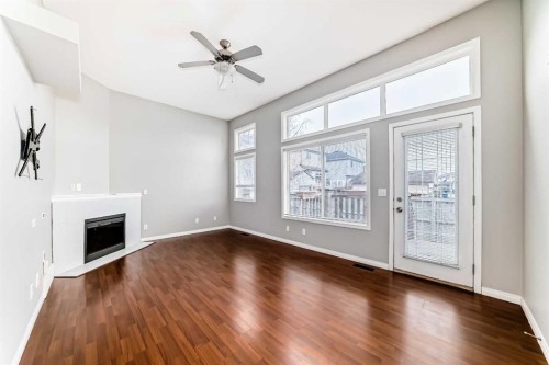 17 Copperfield Court Se, Calgary, AB - Indoor Photo Showing Other Room With Fireplace