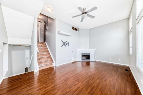 17 Copperfield Court Se, Calgary, AB - Indoor With Fireplace