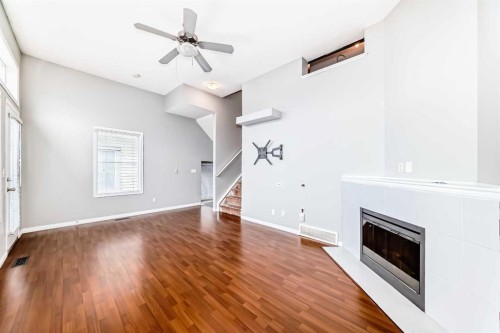 17 Copperfield Court Se, Calgary, AB - Indoor With Fireplace
