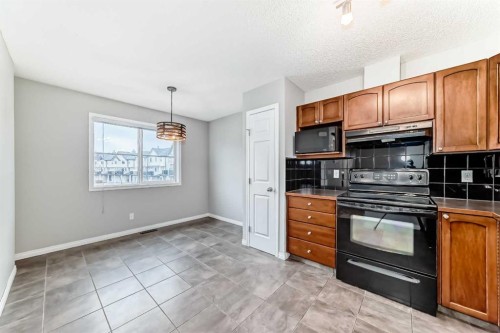 17 Copperfield Court Se, Calgary, AB - Indoor Photo Showing Kitchen