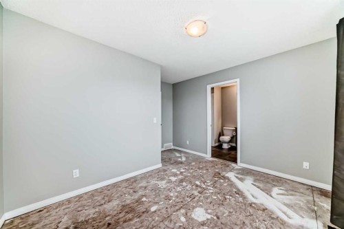 17 Copperfield Court Se, Calgary, AB - Indoor Photo Showing Other Room