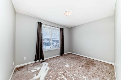 17 Copperfield Court Se, Calgary, AB - Indoor Photo Showing Other Room