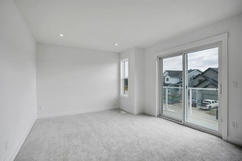 75 Sunvalley Way, Cochrane, AB - Indoor Photo Showing Other Room