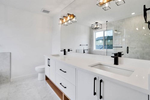 75 Sunvalley Way, Cochrane, AB - Indoor Photo Showing Bathroom