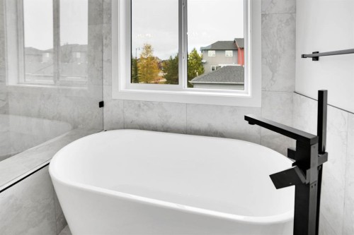 75 Sunvalley Way, Cochrane, AB - Indoor Photo Showing Bathroom