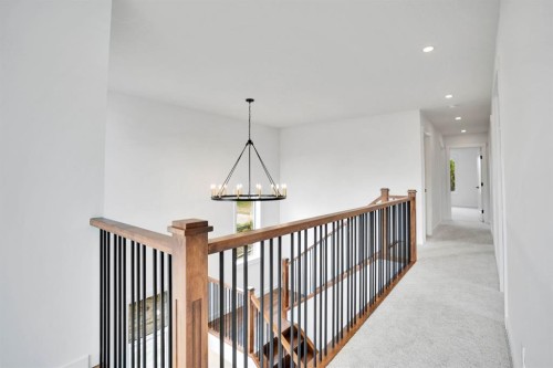 75 Sunvalley Way, Cochrane, AB - Indoor Photo Showing Other Room