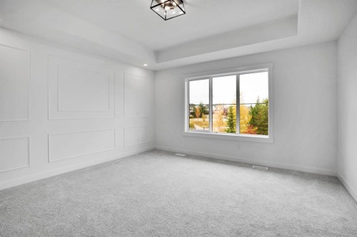 75 Sunvalley Way, Cochrane, AB - Indoor Photo Showing Other Room