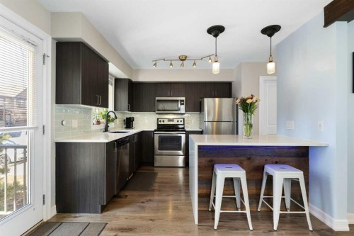 125 Copperpond Common Se, Calgary, AB - Indoor Photo Showing Kitchen With Stainless Steel Kitchen With Upgraded Kitchen