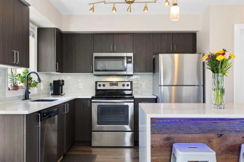 125 Copperpond Common Se, Calgary, AB - Indoor Photo Showing Kitchen With Stainless Steel Kitchen With Upgraded Kitchen