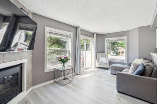 1336 154 Avenue Sw, Calgary, AB - Indoor Photo Showing Living Room With Fireplace