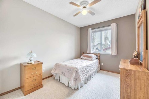 280 Cramond Close Se, Calgary, AB - Indoor Photo Showing Bedroom