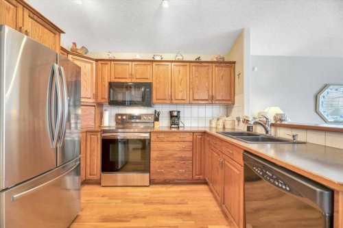 280 Cramond Close Se, Calgary, AB - Indoor Photo Showing Kitchen With Double Sink