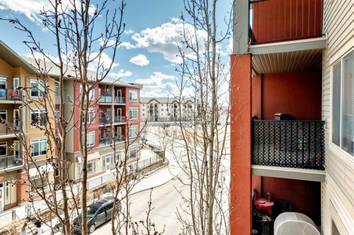 1305-403 Mackenzie Way Sw, Airdrie, AB - Outdoor With Balcony