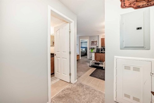 1305-403 Mackenzie Way Sw, Airdrie, AB - Indoor Photo Showing Other Room