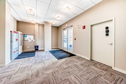 1305-403 Mackenzie Way Sw, Airdrie, AB - Indoor Photo Showing Other Room