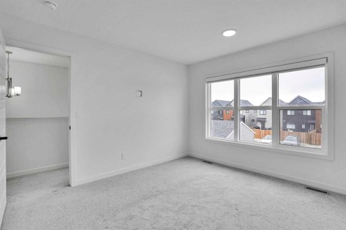 55 Setonstone Landing Se, Calgary, AB - Indoor Photo Showing Other Room