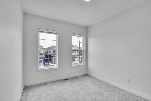 55 Setonstone Landing Se, Calgary, AB - Indoor Photo Showing Other Room