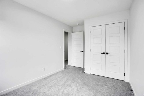 55 Setonstone Landing Se, Calgary, AB - Indoor Photo Showing Other Room