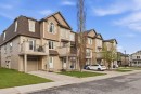 52 Windstone Green Sw, Airdrie, AB  - Outdoor With Balcony With Facade 