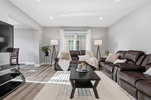 52 Windstone Green Sw, Airdrie, AB - Indoor Photo Showing Living Room