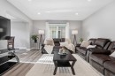 52 Windstone Green Sw, Airdrie, AB  - Indoor Photo Showing Living Room 