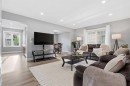 52 Windstone Green Sw, Airdrie, AB  - Indoor Photo Showing Living Room 