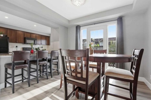 52 Windstone Green Sw, Airdrie, AB - Indoor Photo Showing Dining Room