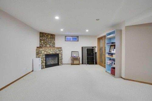 391 Millrise Square Sw, Calgary, AB - Indoor With Fireplace