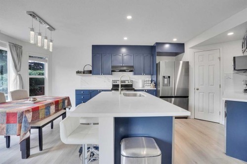 391 Millrise Square Sw, Calgary, AB - Indoor Photo Showing Kitchen With Double Sink With Upgraded Kitchen