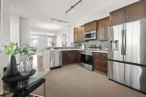 83 Evansview Gardens Nw, Calgary, AB - Indoor Photo Showing Kitchen With Double Sink With Upgraded Kitchen