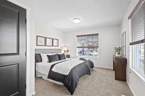 83 Evansview Gardens Nw, Calgary, AB - Indoor Photo Showing Bedroom