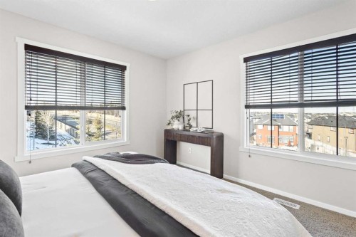 83 Evansview Gardens Nw, Calgary, AB - Indoor Photo Showing Bedroom