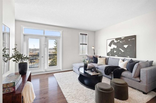 83 Evansview Gardens Nw, Calgary, AB - Indoor Photo Showing Living Room