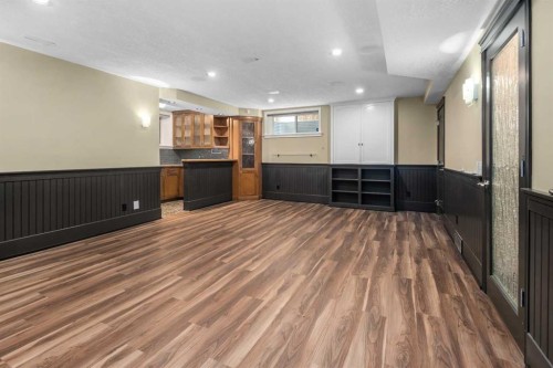 18 Autumn Circle Se, Calgary, AB - Indoor Photo Showing Other Room With Fireplace