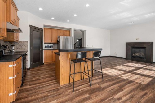 18 Autumn Circle Se, Calgary, AB - Indoor Photo Showing Other Room With Fireplace