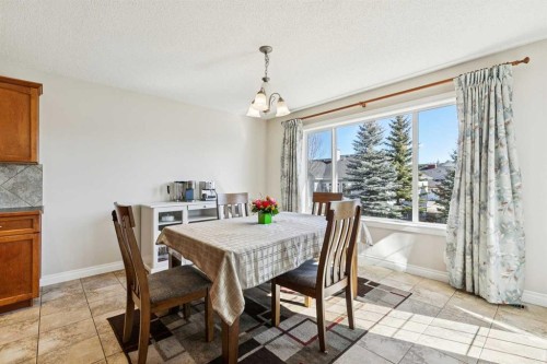 63 Westmount Circle, Okotoks, AB - Indoor Photo Showing Dining Room